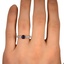 The Amali Ring, smallzoomed in top view on a hand