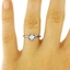 The Irene Ring, smalltop view on a hand