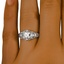 The Flavia Ring, smallzoomed in top view on a hand