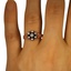 The Lis Ring, smallzoomed in top view on a hand