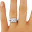 The Adrienne Ring, smallzoomed in top view on a hand