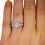 The Lyre Ring, smallzoomed in top view on a hand