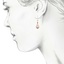 The Latasha Earrings, smalltop view on a hand