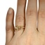The Dacie Ring, smallzoomed in top view on a hand