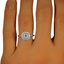 The Calligenia Ring, smallzoomed in top view on a hand