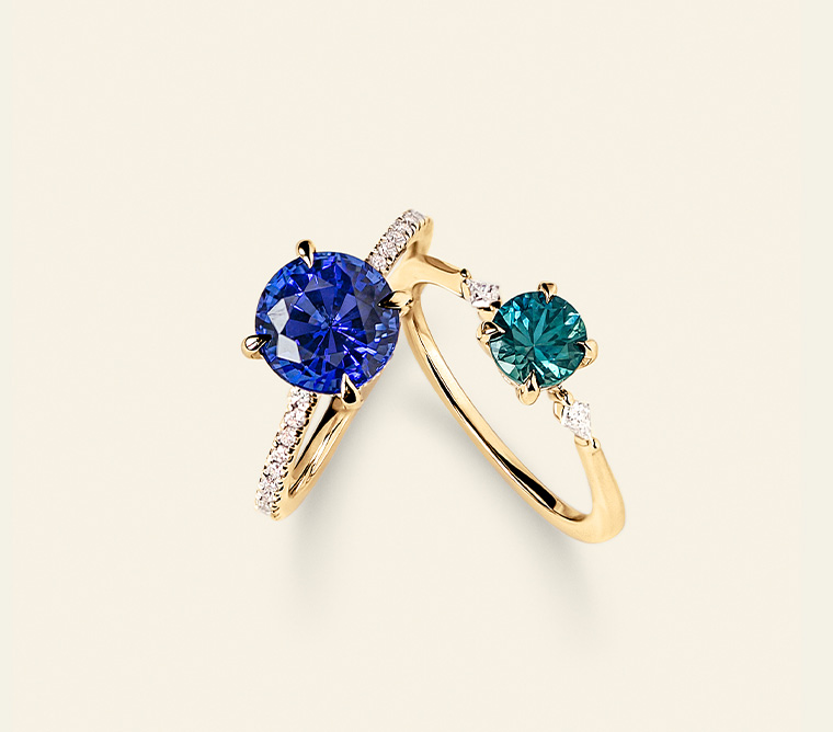 Gold gemstone rings with diamond accents