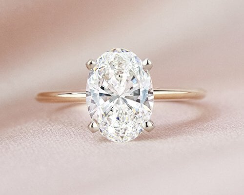 Rose gold oval diamond engagement ring