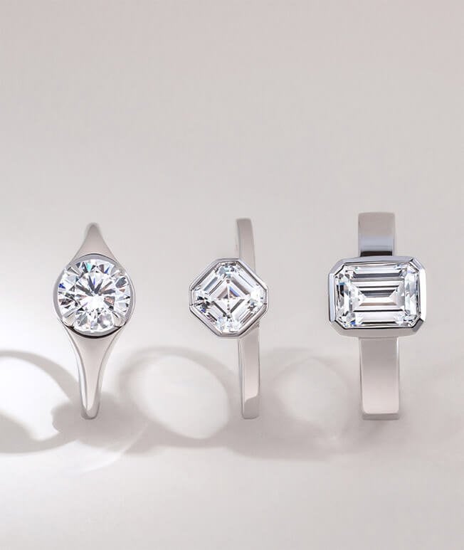 Unique white gold bezel diamond rings