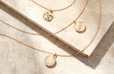 Three fairmined gold pendant necklaces